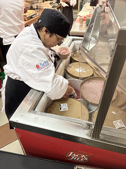 Allie Love scooping ice crream